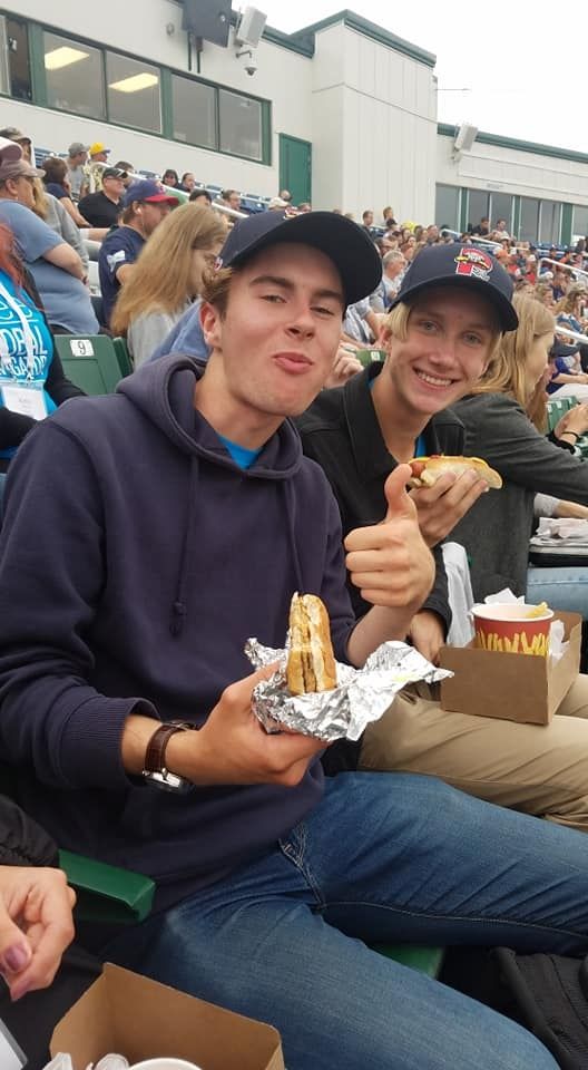 Enjoying classic baseball food