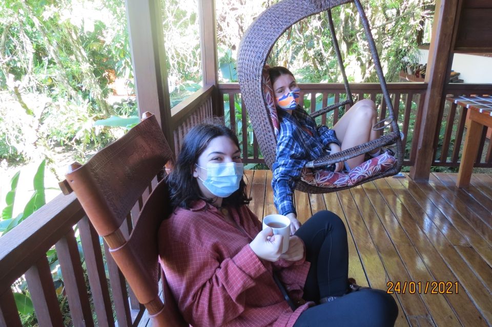 Olivia and Kaitlyn enjoying tea on the porch