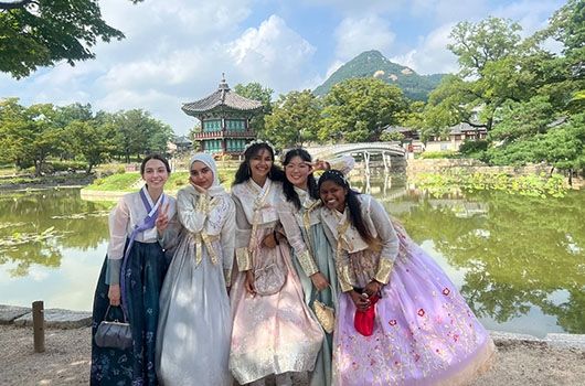 ciee seoul students wearing hanbok at a temple