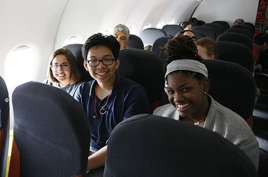study abroad in london students on plane