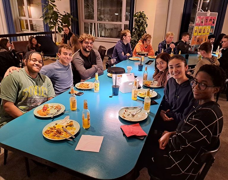 ciee january berlin students eating dinner together