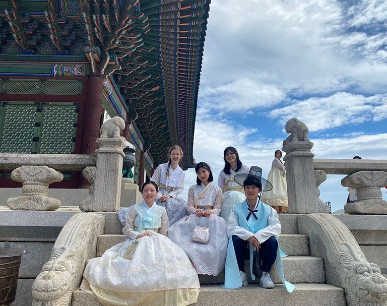 students on cultural excursion at throne hall korea