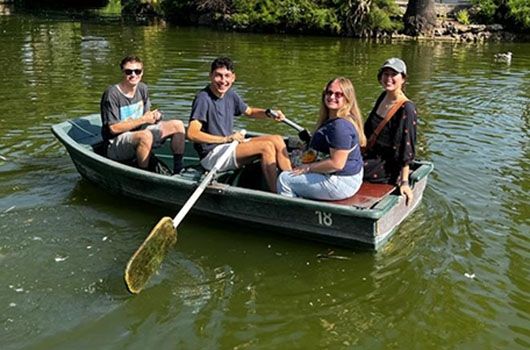 students boating in barcelona