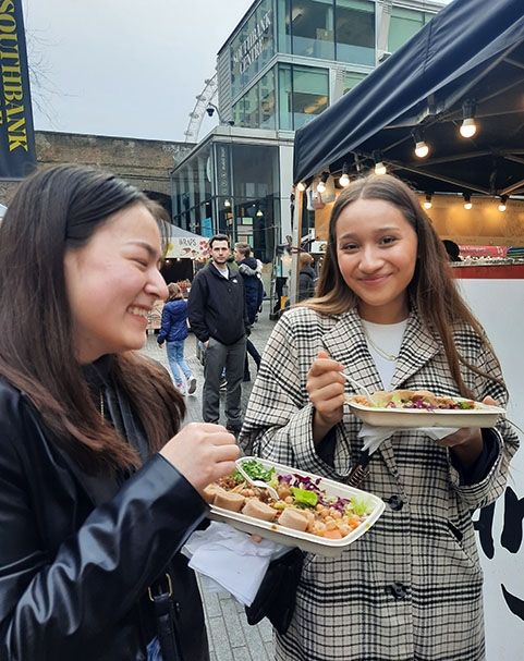 students enjoying local cuisine in london