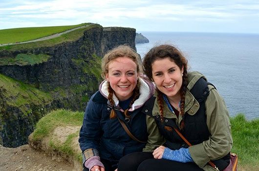 two study abroad students at the cliffs of ireland