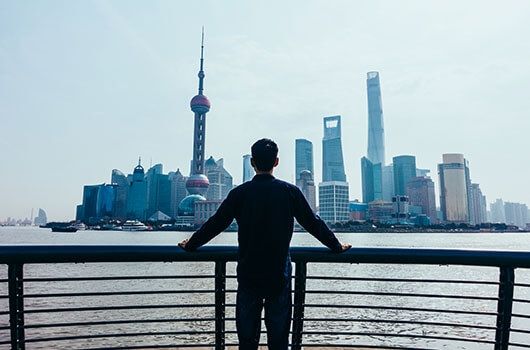 student in shanghai by water