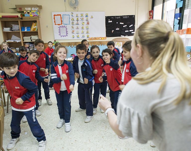 foreign language english class with students and teacher