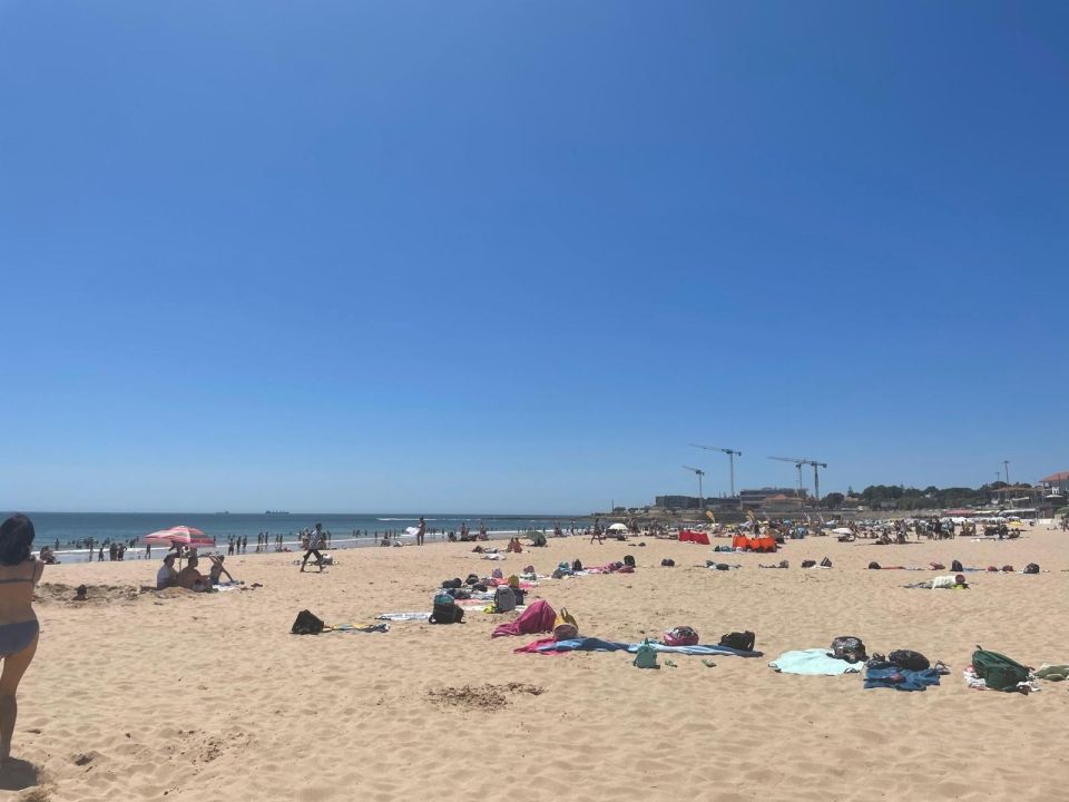 Picture of Carcavelos Beach vista. Bright blue skies and white sand!