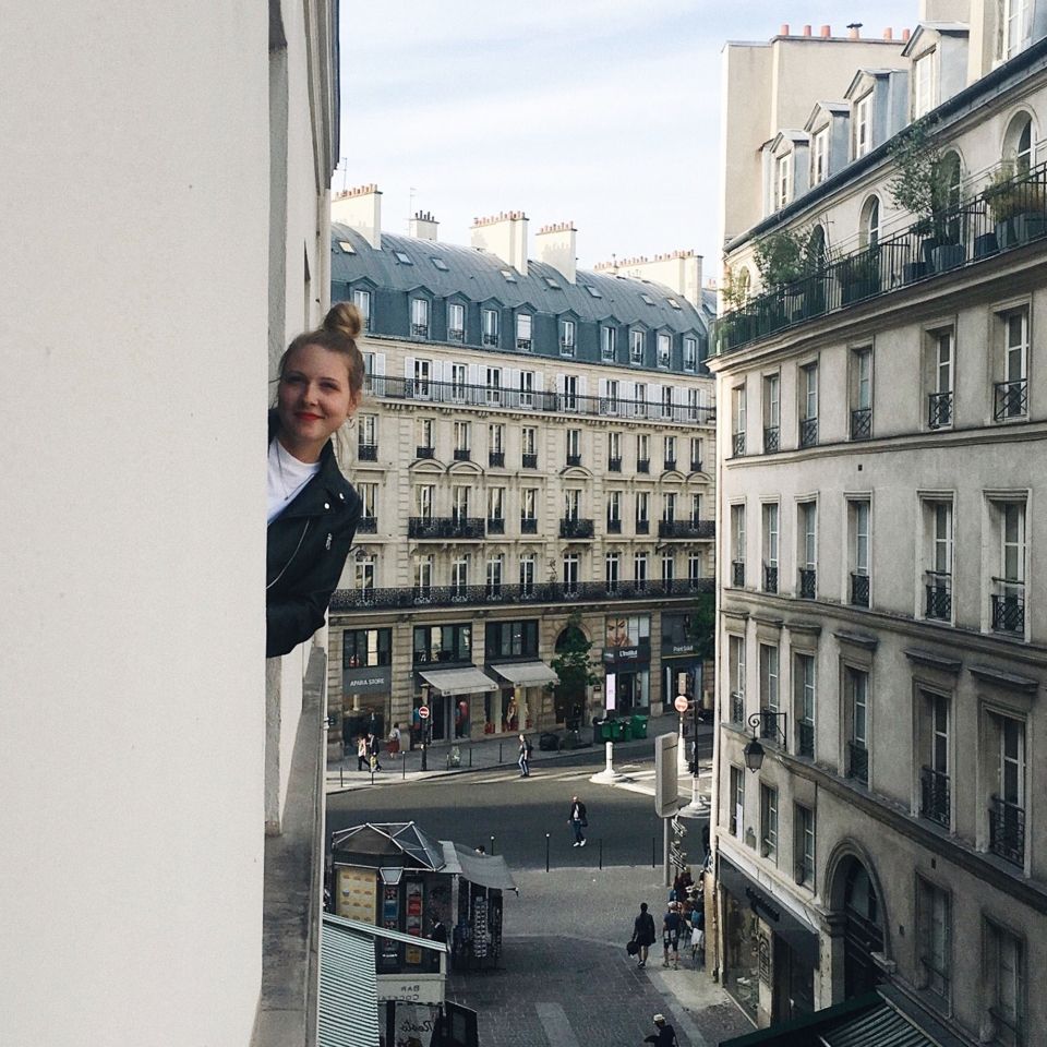 paris student leaning out window