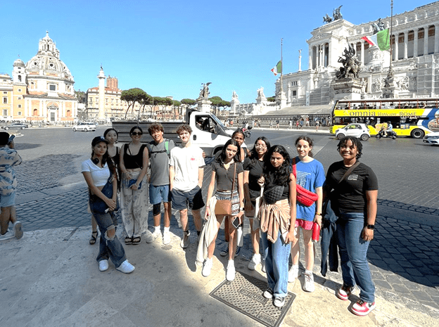 high school students at wedding cake monument