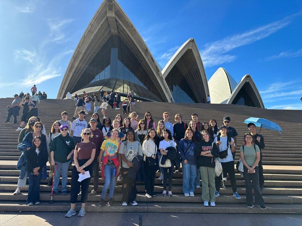 Group of high school students posing in front of the Sydney Opera House
