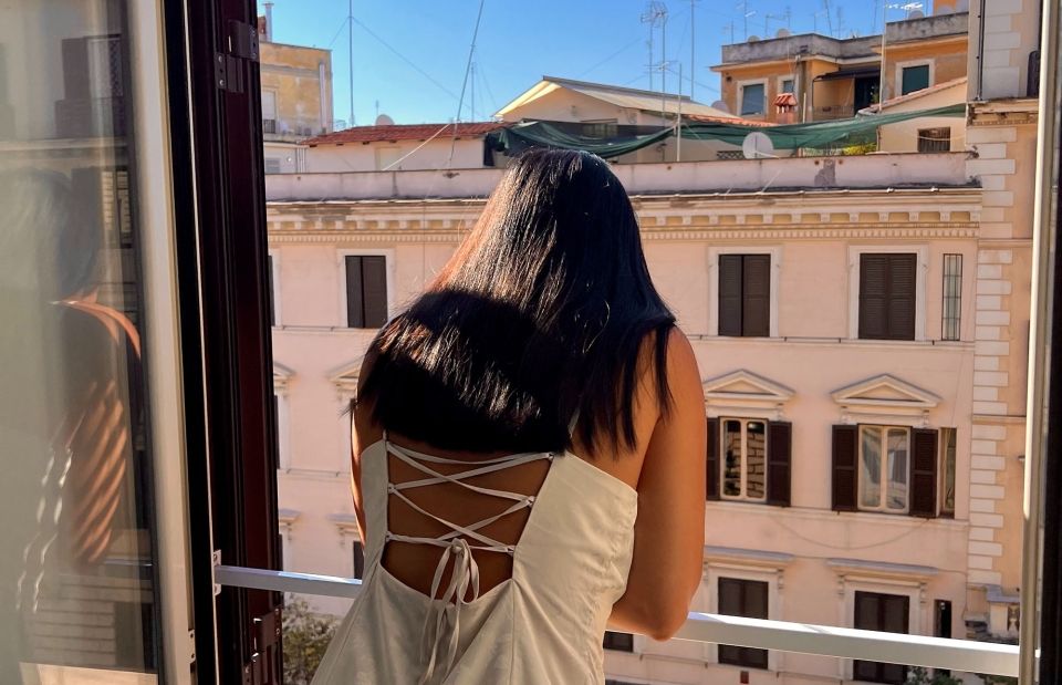 student rome overlooking city street