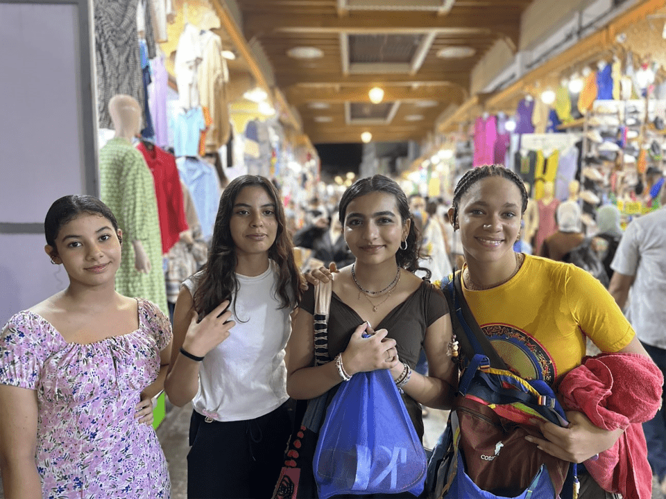 High school girls posing in Moroccan market