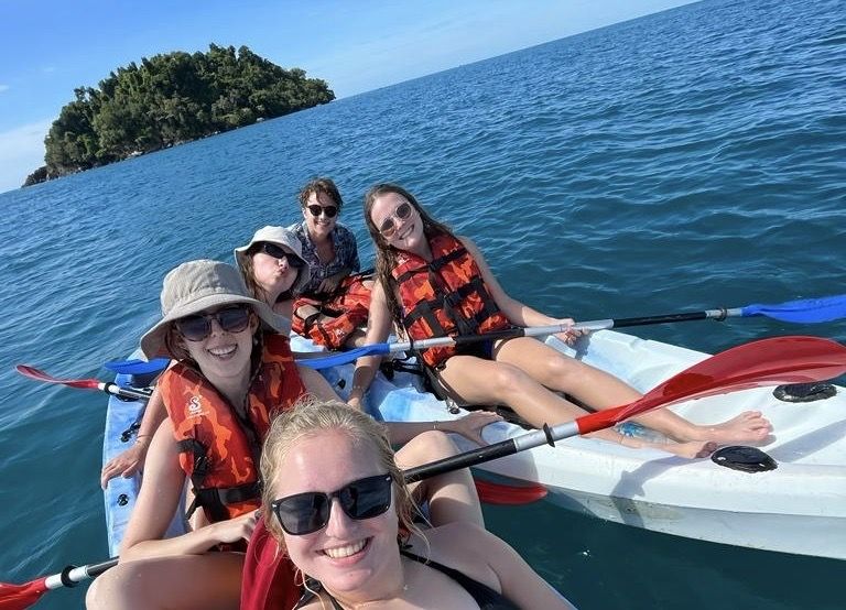 A group of friends on kayaks off of Lonely Beach, Koh Chang.