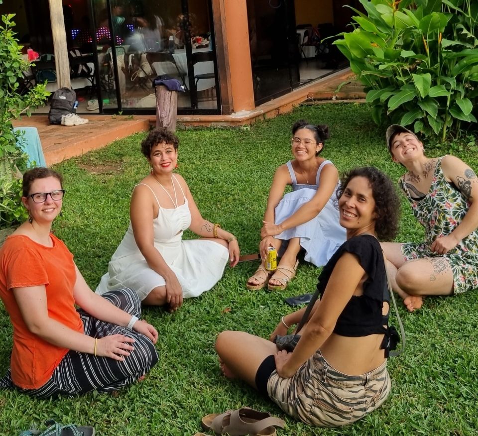 High School Summer Abroad in Yucatan Program Leaders sit an discuss lessons