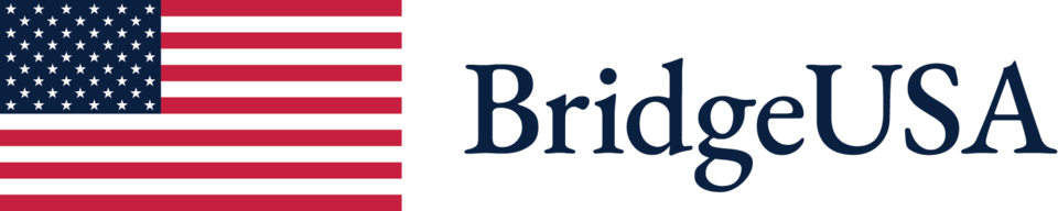 A logo that consists of an american flag and the text "BridgeUSA"