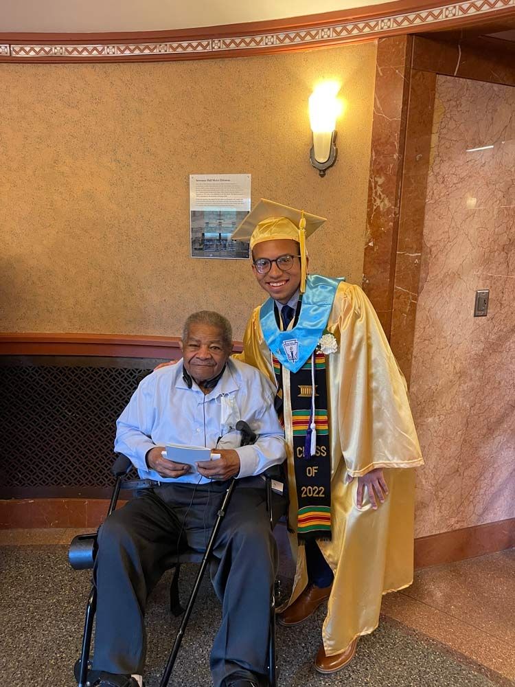 Perryman is pictured here with his paternal grandfather, Henry, at his high school graduation.
