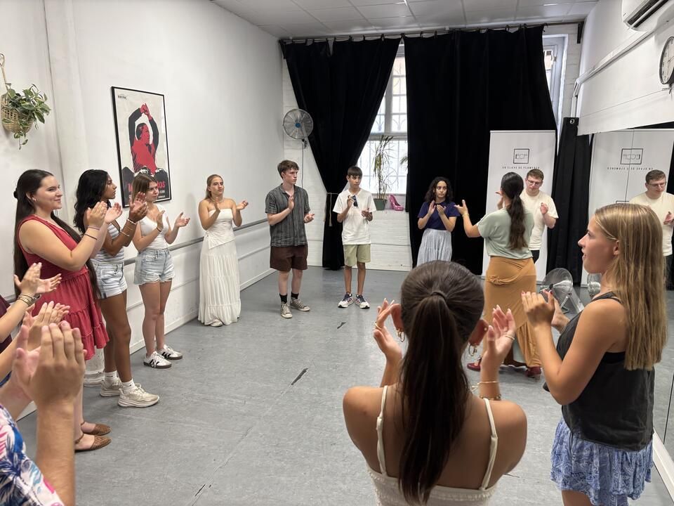 Group of students clapping 