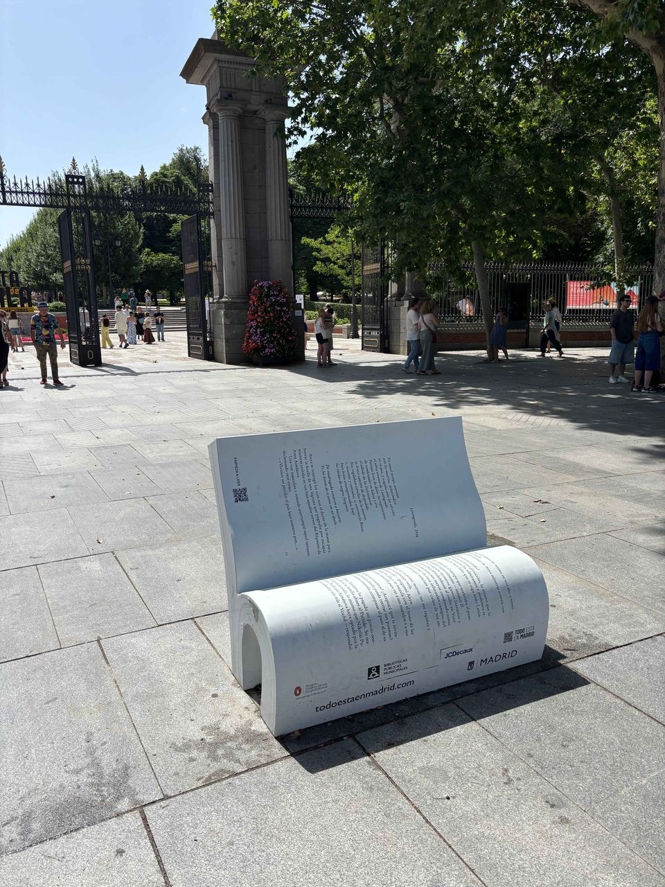 A bench designed to resemble an open book outside Retiro park.