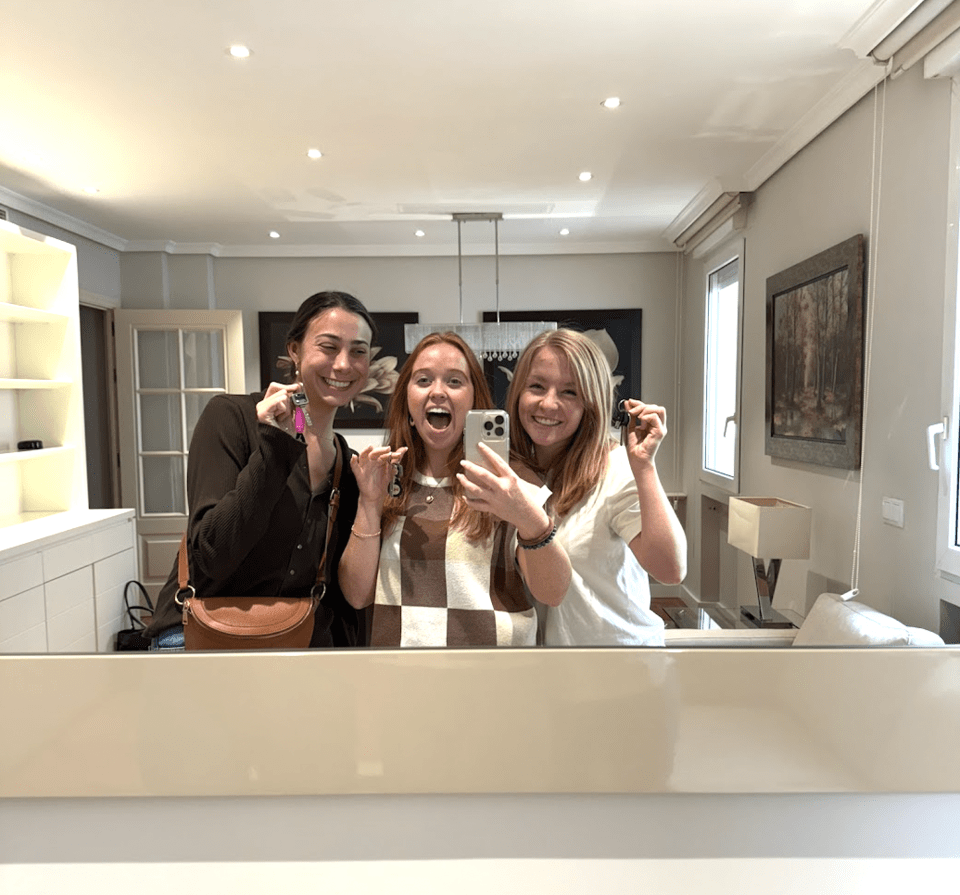 Celebratory Photo Holding the Keys to Our Piso