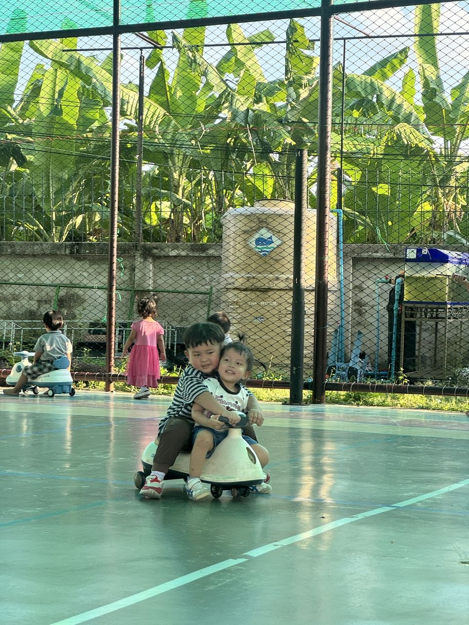 students sharing a scooter