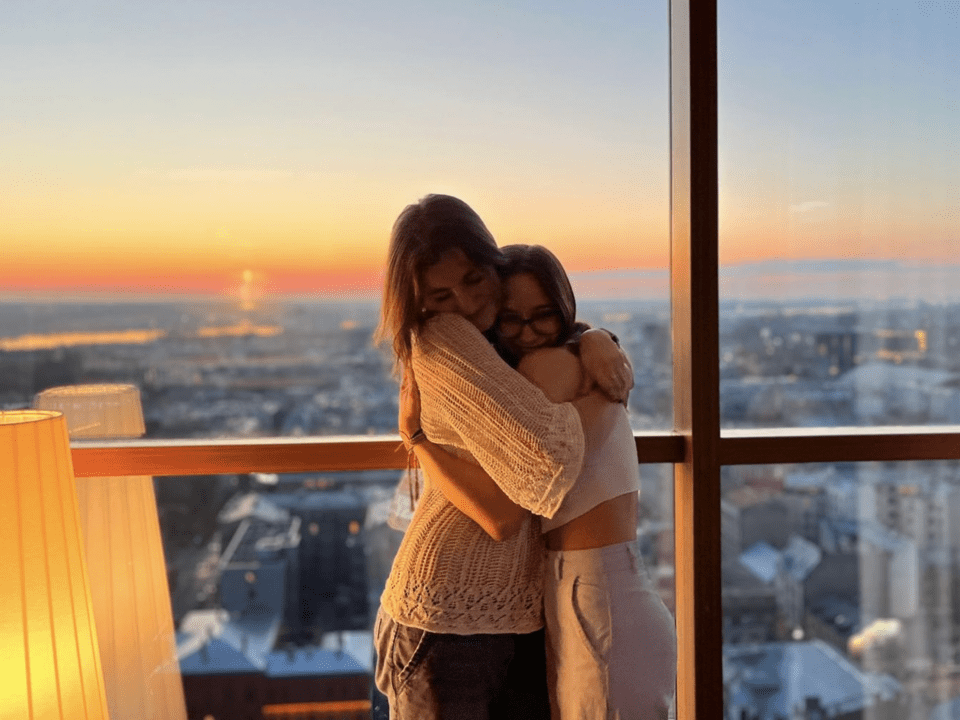 Rali and Rachel sharing a snuggle at the Radisson Blu Sky Bar