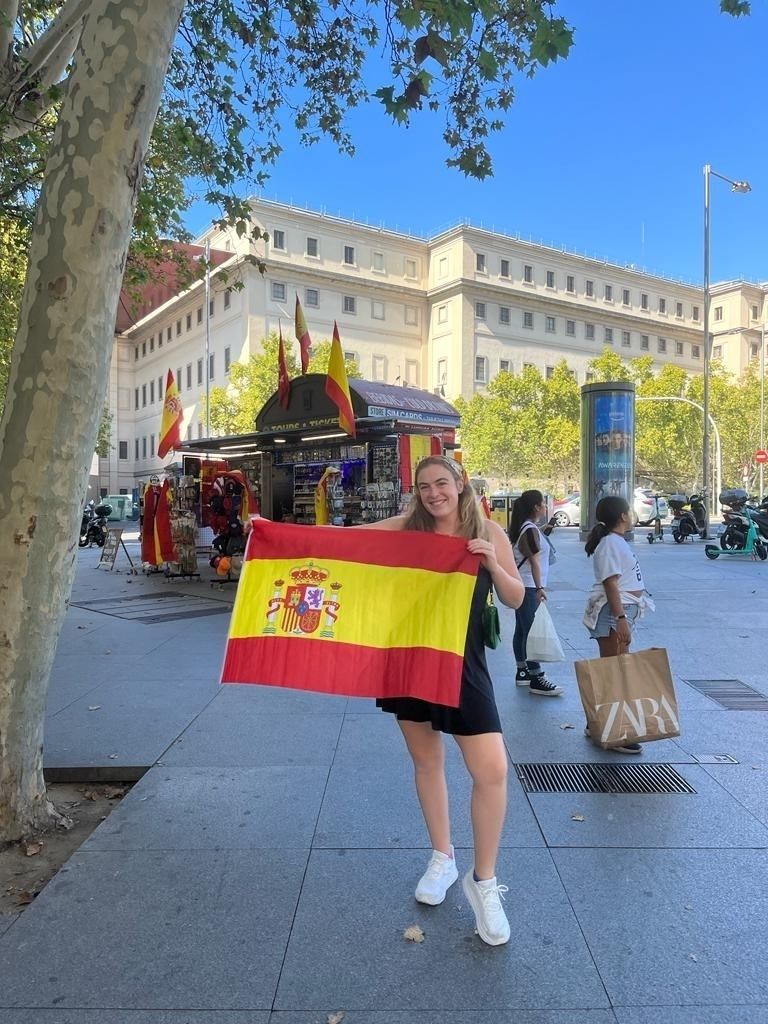 Erin Backhaus with the Spain flag