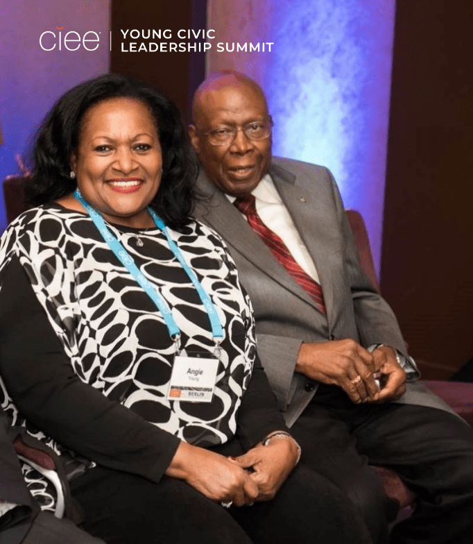 An older Black couple sit side-by-side, its Ambassador Young and his wife Angie Young