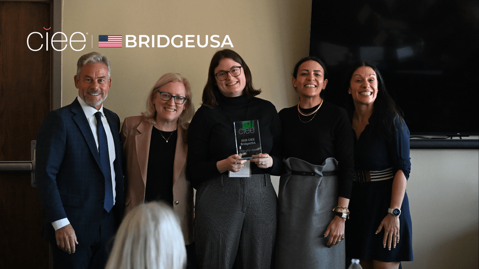 Hannah Albin, Deputy District Director for Congressman Mike Kennedy, receives a 2026 CIEE BridgeUSA Champion Award for community leadership during an event in Park City, Utah.