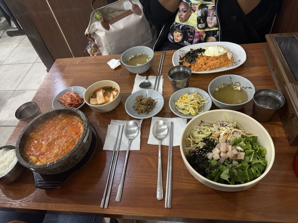 Picture of 3 plates of Korean food, Sundubu, Tuna Rice, and Kimchi Rice