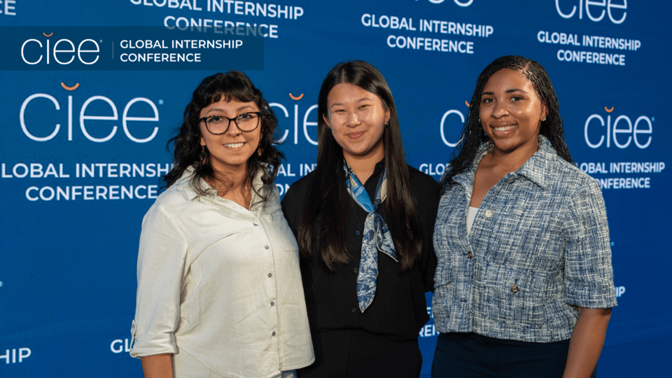 Three members of CIEE’s inaugural paid global internship cohort pose together at the 14th Annual Global Internship Conference in Tallinn, Estonia