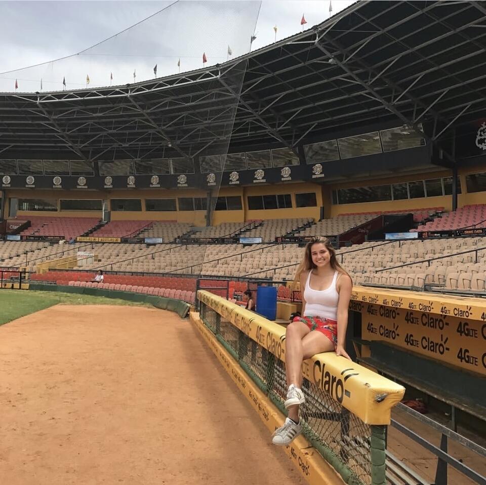 Octavia Tey visits a baseball stadium in Santiago de los Caballeros, Dominican Republic.
