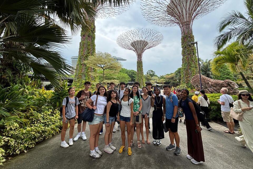 Singapore CIEE students posing by super trees in Singapore garden