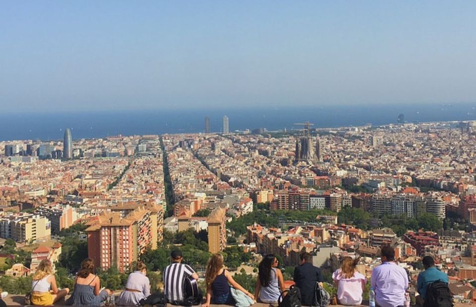 barcelona city overlook view students sitting