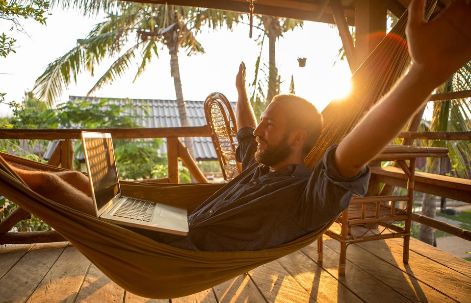 study abroad student hammock sunset