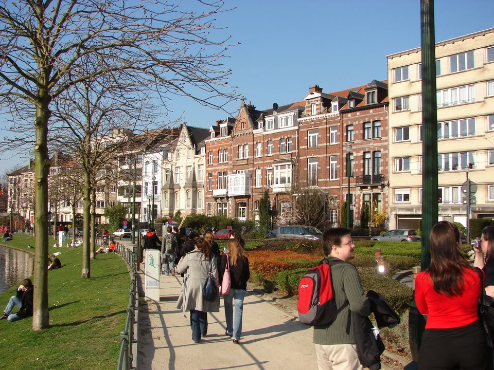 Students walking along busy pathway in Brussels, Belgium