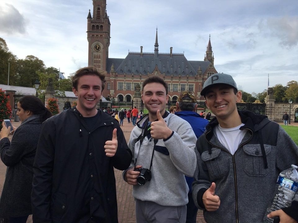 CIEE Students posing at monument in Brussels, Belgium