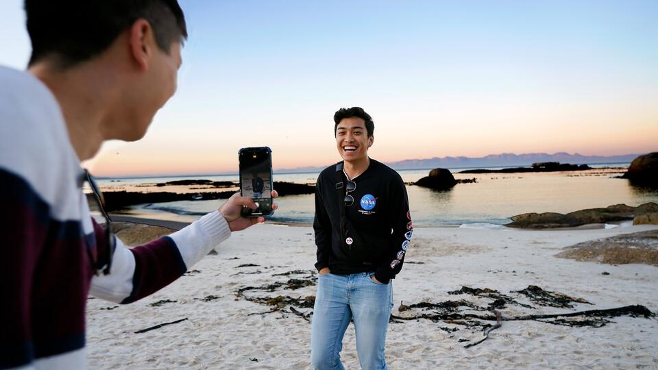 cape-town-fdgf-2023-students-taking-photos-beach