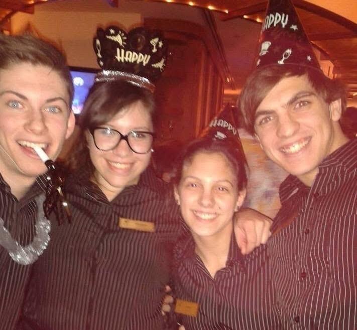 Jolicoeur, second from left, celebrates New Year's Eve with coworkers.