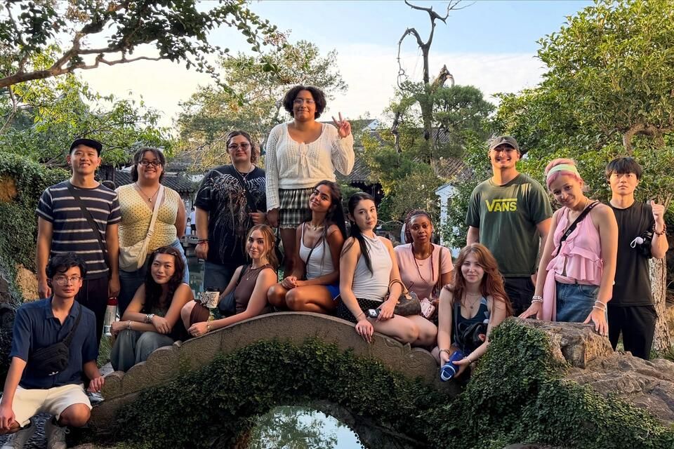 CIEE Shanghai students pose for photo in nature during trip to Suzhou