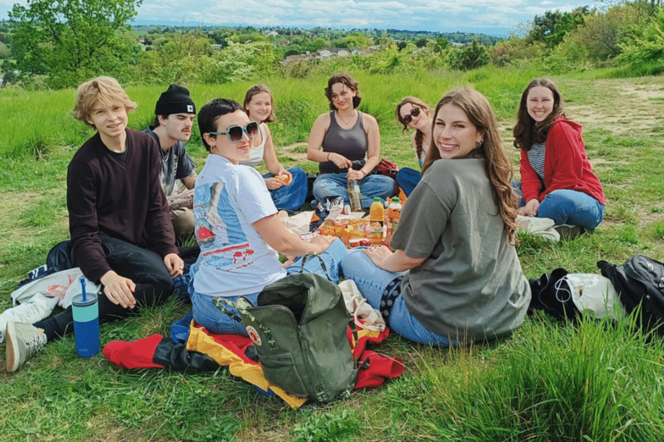 Study Abroad group just chilling on top of Pech David after the hike activity