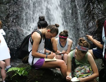 Monteverde_Students sitting in the nature listening.jpg